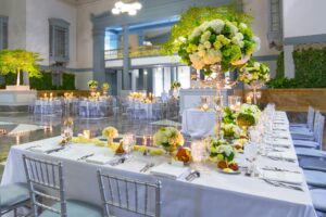 wedding venue decorated with beautiful floral arrangements for the wedding to come.